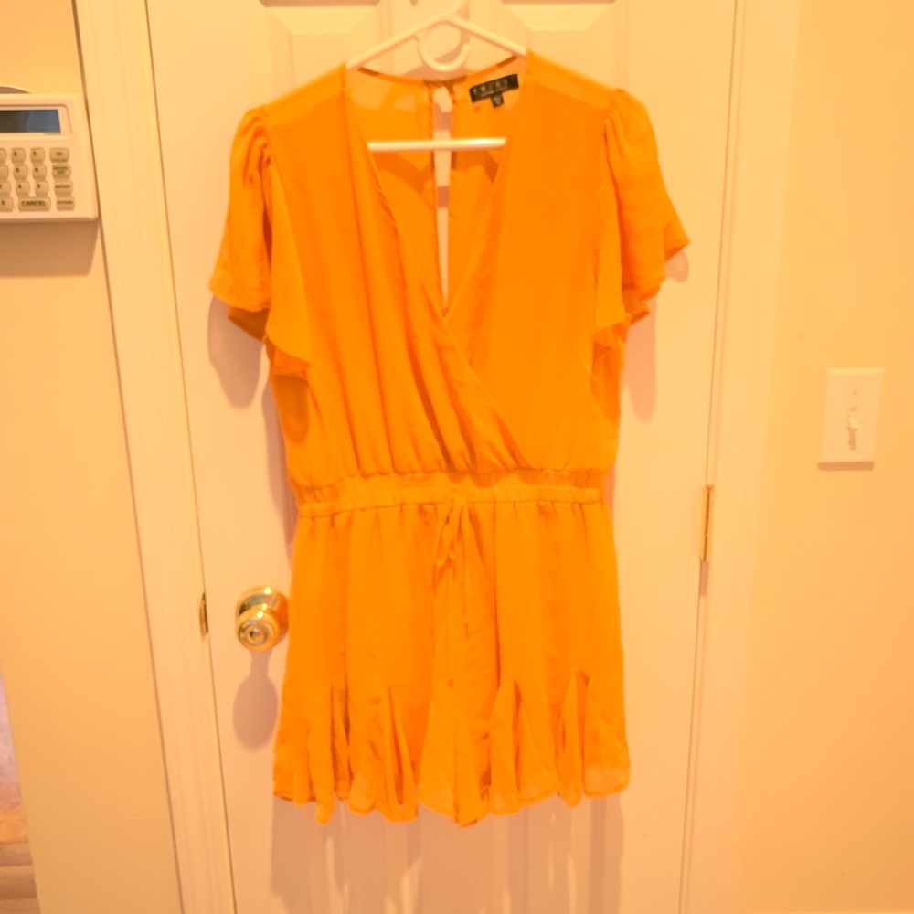 Romper with ruffled skirted bottom